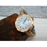 Ladies 9ct gold watch