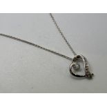 9ct white gold diamond pendant and chain