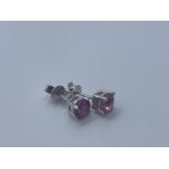 18ct white gold and pink sapphire earrings