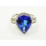 Platinum tanzanite and diamond ring