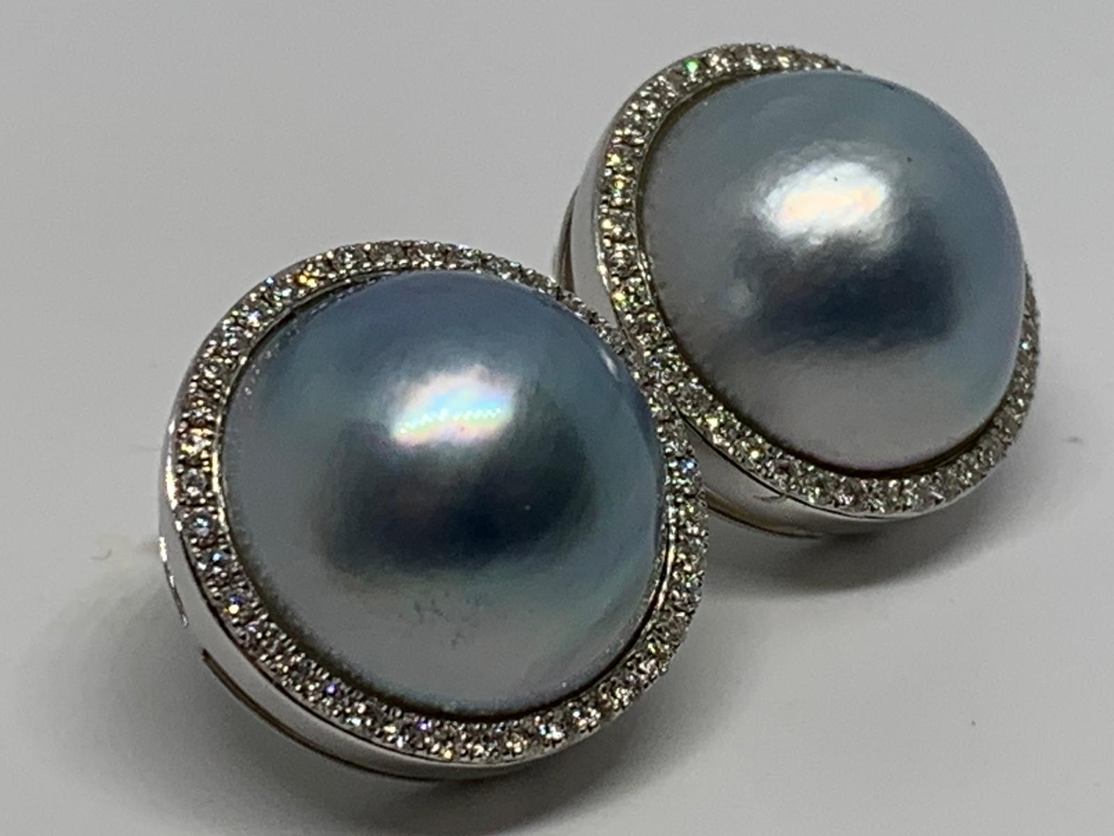 9ct white gold, blue mabe pearl and diamond earrings