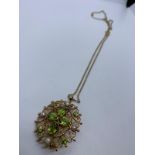 9ct gold peridot and pearl brooch/ pendant on chain