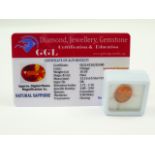 Loose unmounted oval natural orange sapphire. 10.50ct