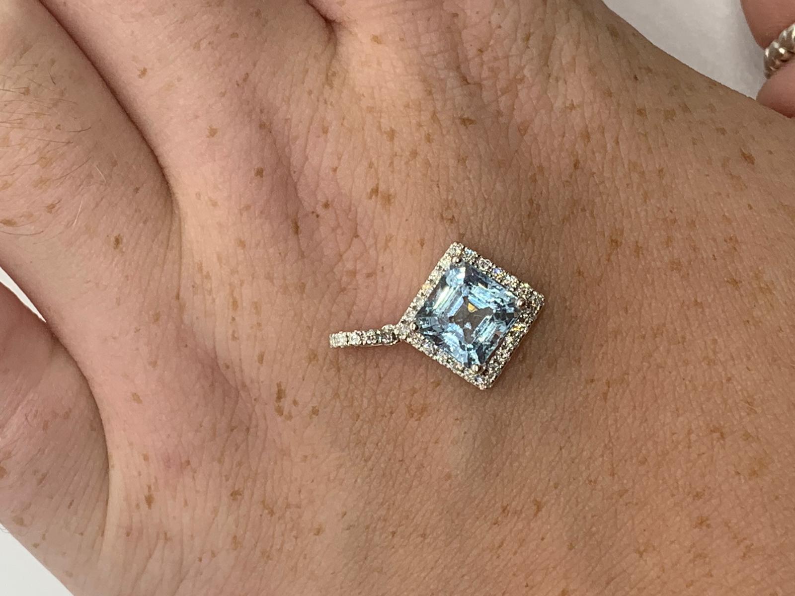 18ct white gold aqua marine and diamond pendant