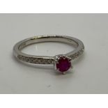 Platinum ruby and diamond ring