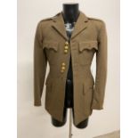 A military style army jacket with gilt buttons. Size 40-42.