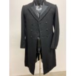 An Edwardian frock coat. Size 40