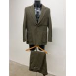 A country tweed shooting suit with plus 4s by John Hardy. Size 40/36