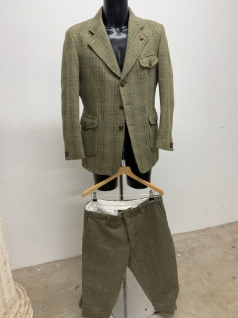 A vintage pure wool tweed shooting jacket size. 40 with a pair of plus 4s 36 waist.