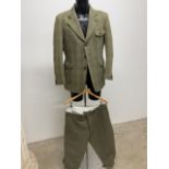A vintage pure wool tweed shooting jacket size. 40 with a pair of plus 4s 36 waist.