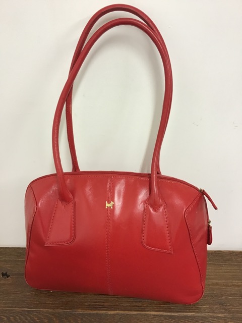 A red leather Radley shoulder bag.