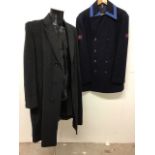 A vintage railway operators coat together with a vintage overcoat.