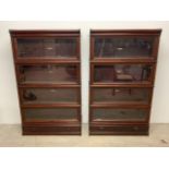 A pair mahogany Globe Wernicke bookcases with four glazed sections and base with drawer W:87cm x D: