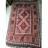 A Kelim style rug. 188cm x 112cm