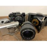 An Olympus camera and lens, Kodak Brownie camera etc