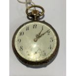 A silver cased crown wind open faced pocket watch. White enamel face with arabic markers and