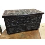 A carved East African Iron wood casket. W:40cm x D:20cm x H:22cm