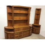 A mid century teak four piece wall unit by Nathan.