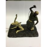 A Franz Bergman style cold painted bronze figure group of a man and slave girl. Impressed mark to