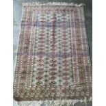 An Oriental style machine woven rug. W:190cm x D:cm x H:124cm