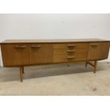 A mid century sideboard by Avalon W:204cm x D:43.5cm x H:cm W:204cm x D:43.5cm x H:72cm