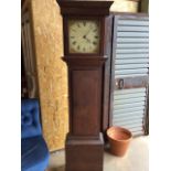 A Victorian mahogany long case clock, painted face with Roman numeral markers. Face signed