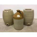 Two ceramic cider barrels together with a large cider flask. Each H:37cm