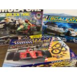 Two scalextric sets and another