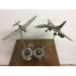 Two scratch built white metal desk ornaments models of aircraft. 33cm(h)
