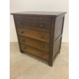 A stylish oak chest of four drawers W:79cm x D:45cm x H:81cm