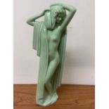 An Art Deco style ceramic figurine W:13cm x D:10cm x H:49cm