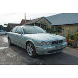 A Jaguar XJ8. 4.2L aluminium body 119 000 miles.