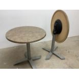 Two folding lockable circular tables with faux marble tops.