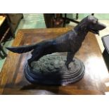 A 20th century cast bronze model of a red setter dog on oval marble base. 30cm x 18cm 29cm(h)