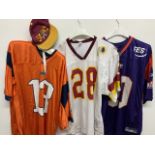 3 American football jerseys and a cap