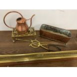 Fire related items to include brass fender, trivet and irons and with copper water kettle and copper