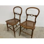 A pair of Victorian mahogany bedroom chairs with rattan seats W:40cm x D:39cm x H:82cm