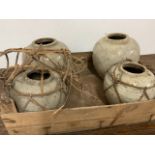 Four rustic pottery jars