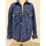 An original import Levi's denim jacket size large