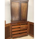 Mahogany veneered cupboard with fitted draws to interior. W:102cm x D:62cm x H:216cm