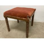 A square 19th century stool with turned legs.