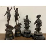Four spelter figurines