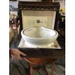 A travelling mahogany carriage sink. Drop front with galleried top. 50cm x 62cm x 24cm.