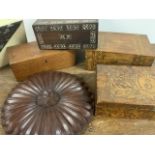 Various wooden boxes including a pokerwork box, inlaid boxes and a turned piece of red mahogany. W: