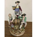 A Meissen style figure group. W:13cm x D:13cm x H:21.5cm