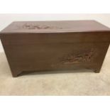 An Oriental camphor wood box W:100cm x D:43cm x H:51cm