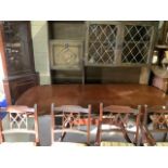 A mahogany reproduction dining table with six chairs (2 carvers) a wall display unit and a corner