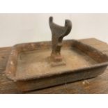 An antique boot scraper. W:27cm x D:22cm x H:14cm