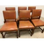 Set of six oak dining chairs, leather with studwork. W:48cm x D:40cm x H:80cm