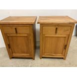 A pair of oak bedside cupboards with makers carved leaf detail by Neil Wynn Jones. W:45cm x D:37cm x